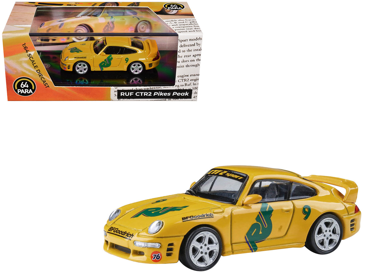 RUF CTR2 #9 inchPikes Peakinch Yellow with Graphics 1/64 Diecast Model Car by Paragon Models