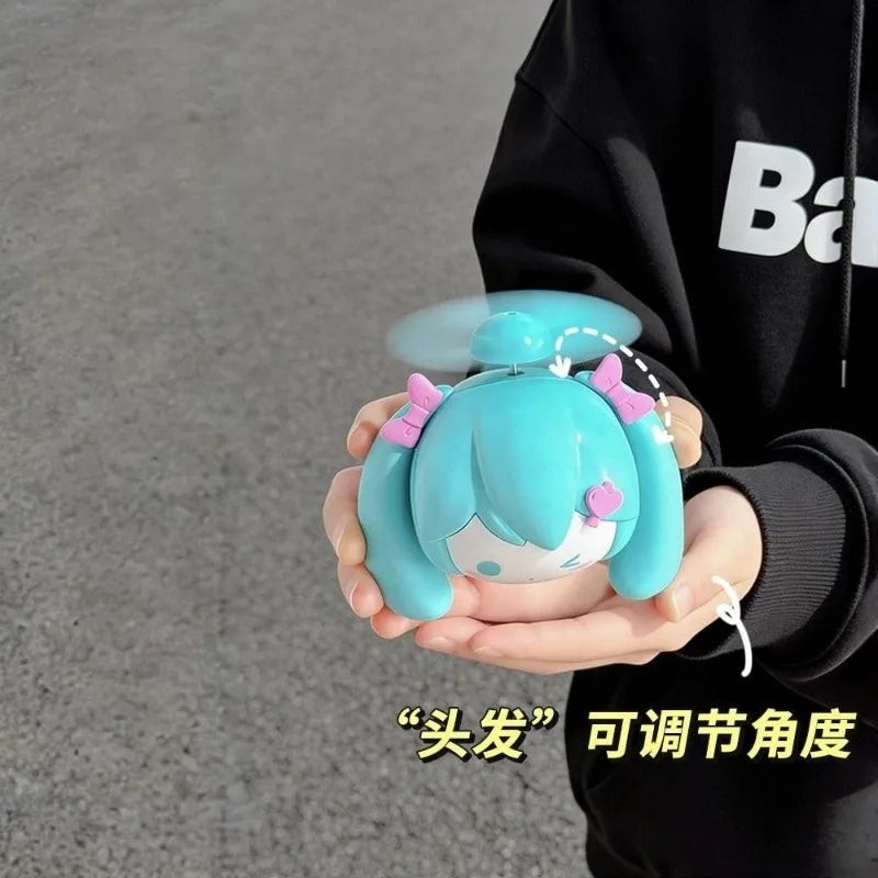 2026 New Hatsune Miku Mini Handheld Fan Ultra-Strong Wind USB Rechargeable Portable Anime Fan for Students Backpack Gift