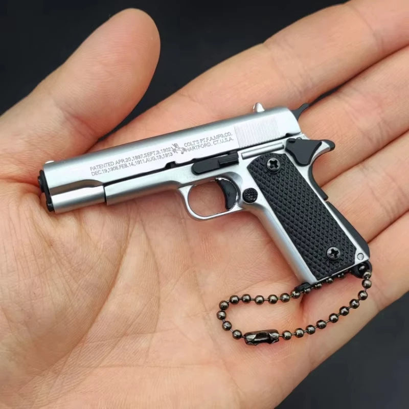 1:3 Scale Full Metal 1911 Gun Model Keychain Pendant with 7 Detachable Bullets Men's Decompression Toy Gift