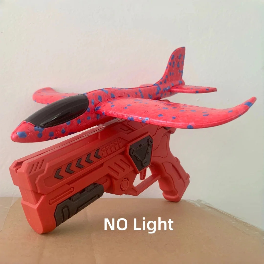 Catapult Foam Plane Gun Fire Outdoor Sports Hand Toss Flying Glider Toy Boys GGirls