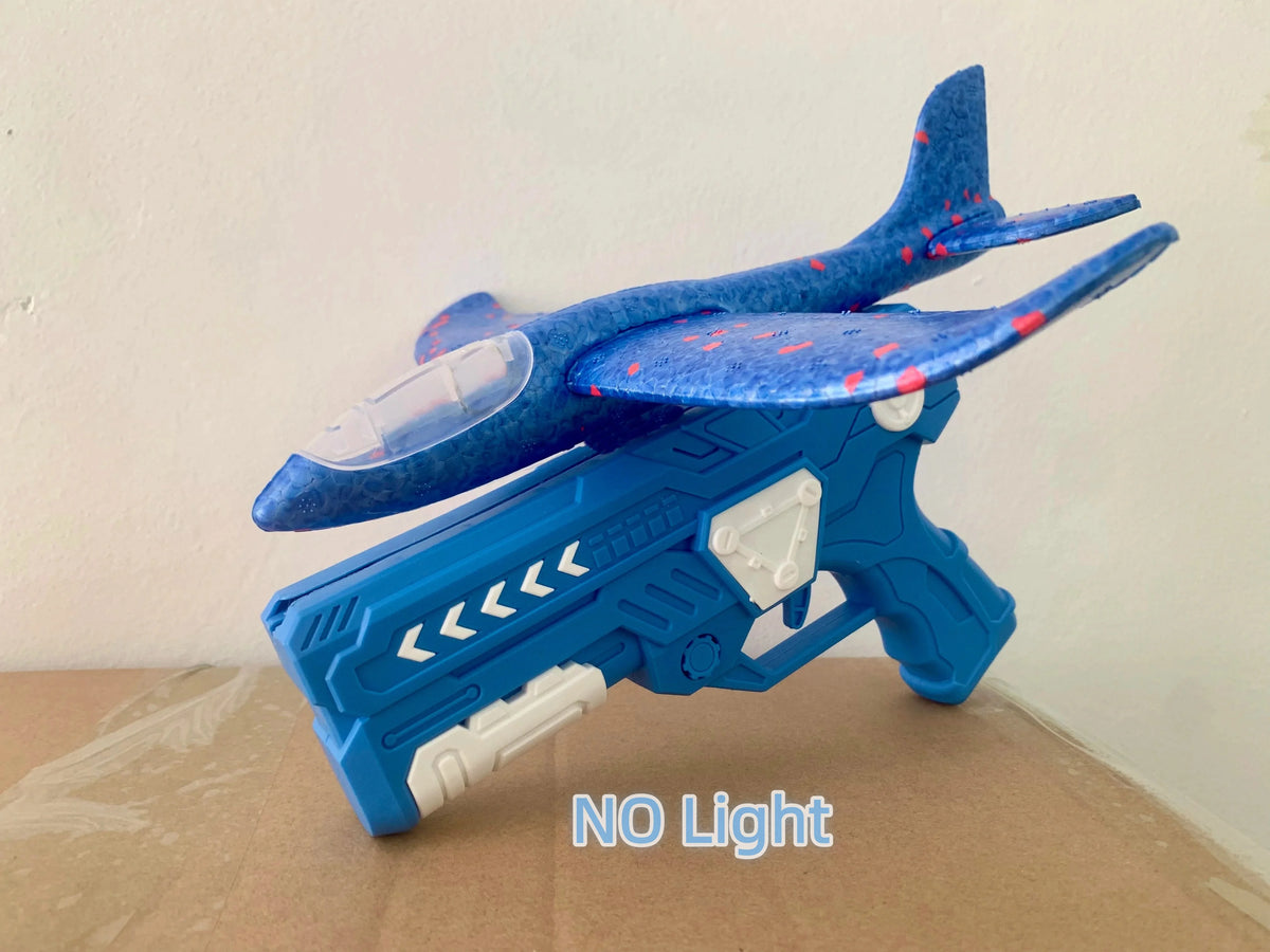 Catapult Foam Plane Gun Fire Outdoor Sports Hand Toss Flying Glider Toy Boys GGirls