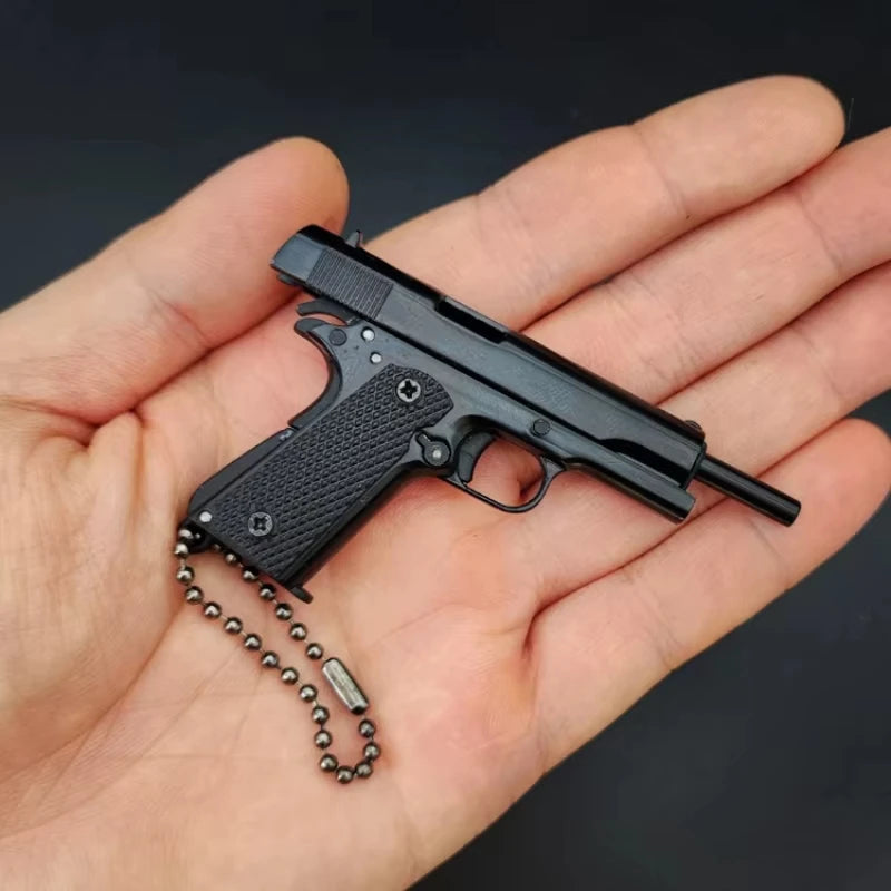 1:3 Scale Full Metal 1911 Gun Model Keychain Pendant with 7 Detachable Bullets Men's Decompression Toy Gift