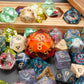 Mystery Liquid Bundle - 9 Dice Sets + 1 RPG Accessory