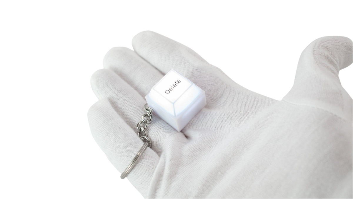 Keychain Fidget Fun: Super Bright White LED Delete Keyboard Button